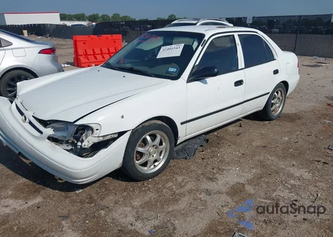 1998 Toyota Corolla Ce from USA, damaged, VIN 1NXBR12E5WZ025437